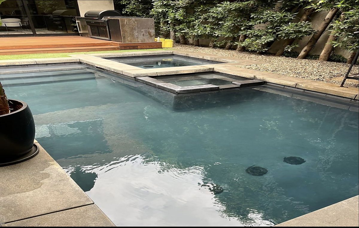 Balanced, crystal clear pool and spa water maintained by ASJEM Pools
